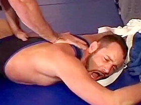 Muscular Fighters Are Banging On The Mat