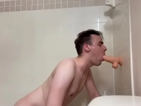 Connor fucks a dildo in the shower